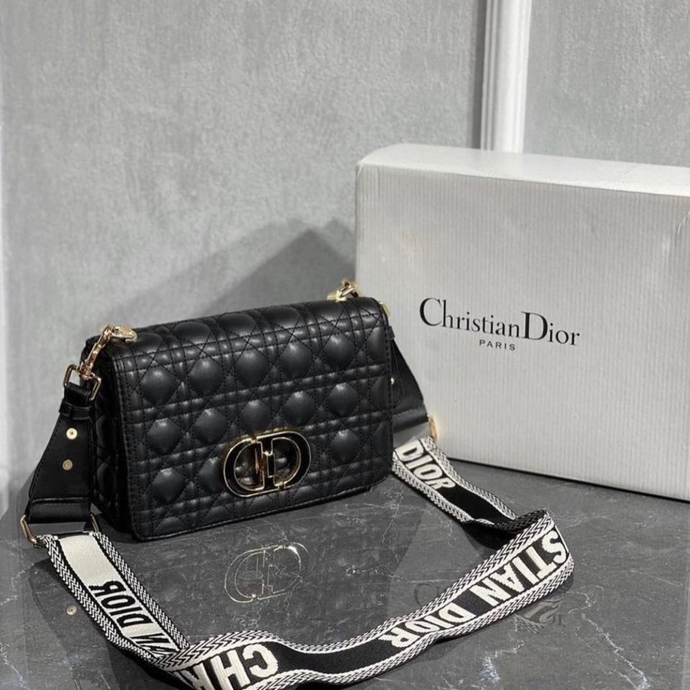 Real leather, condition-new. Comes with dust bag